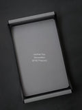 DC052 - Hermès tinware, grey outer stitching, saddle leather, teak scroll armrest tray, desktop storage